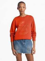 Chompa MK anaranjado estampado en el centro