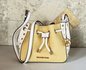 MK Phoebe Small Studded  blanco con dorado